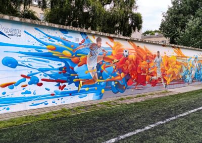 wykonany mural przy boisku Osir w Warszawie - sportowcy i graffiti 3d