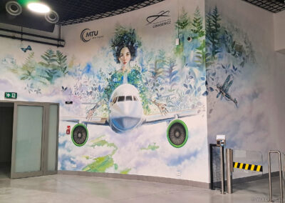 mural przedstawiający lotnictwo ekologiczne i nowoczesne